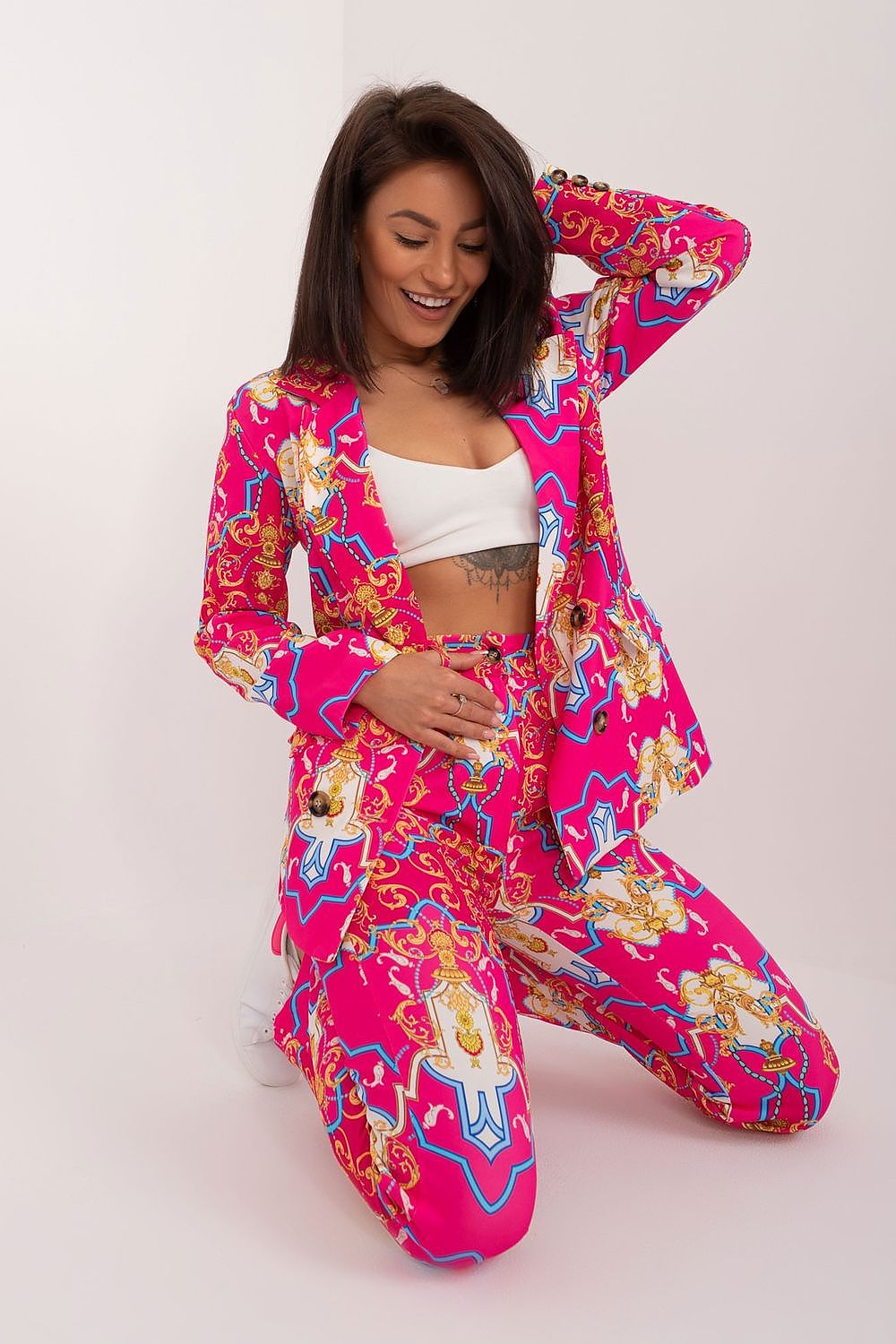 Italy Moda's luxurious women's suit set with unique print, showcasing the high-quality material and tailored fit of long sleeves and straight leg trousers.