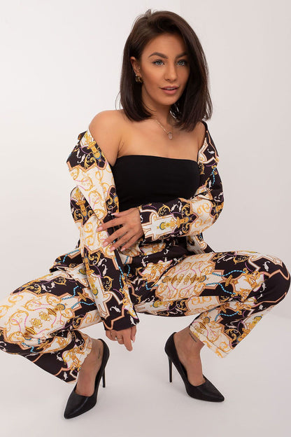 Close-up of Italy Moda's elegant women's 2-piece suit set, showcasing the unique and original print on the high-quality fabric.