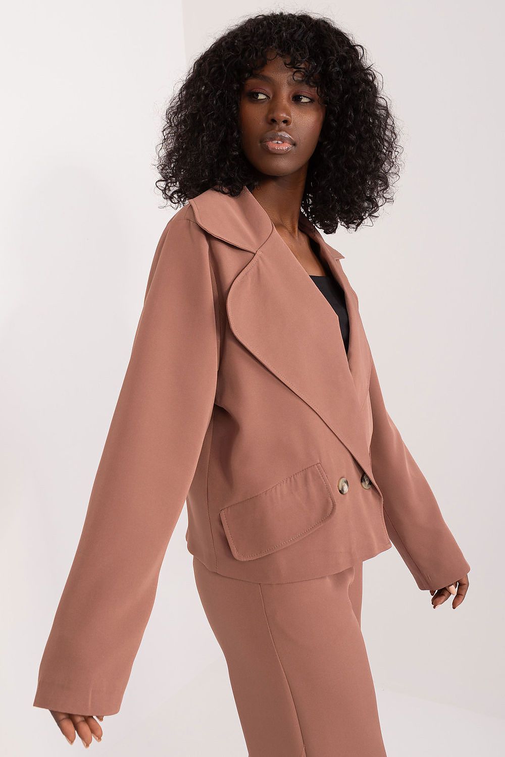 Stylish long-sleeve blazer by Lakerta displayed with a focus on high-quality craftsmanship and elegant lapels for versatile styling.