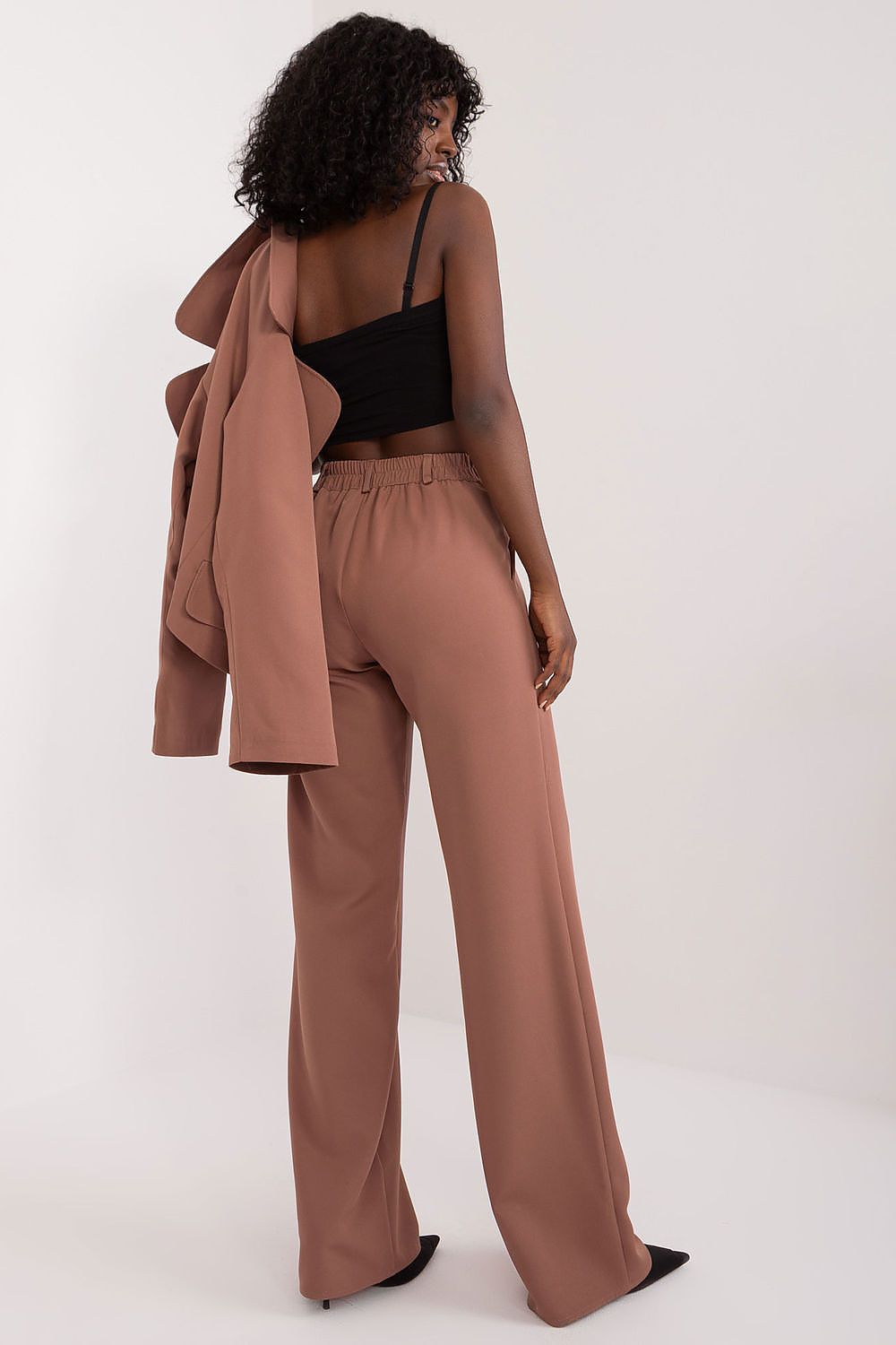 Chic Lakerta fabric pants with elegant design, accentuating the silhouette and perfect for adding sophistication to any wardrobe.