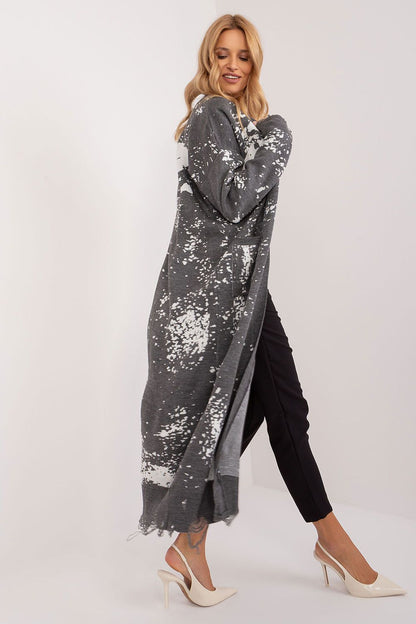 Elegant ankle-length Badu cardigan by Badu featuring a unique print and practical pockets, made from soft acrylic material.