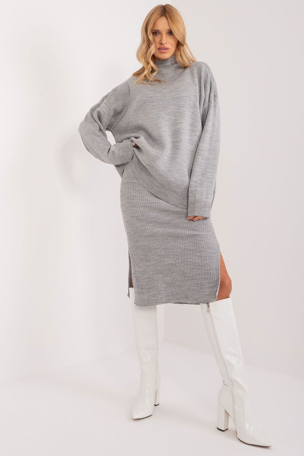 Model wearing the luxurious 2-Piece Casual Sweater and Turtleneck Dress Set by Badu, highlighting the stylish combination suitable for both work and leisure.
