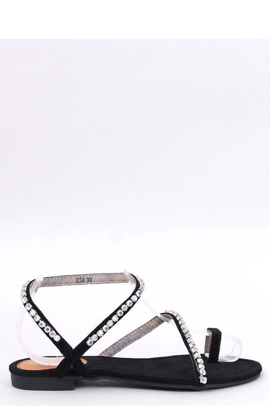 Luxurious Inello women's suede flip flop sandals featuring glittering stone straps for an elegant summer look.