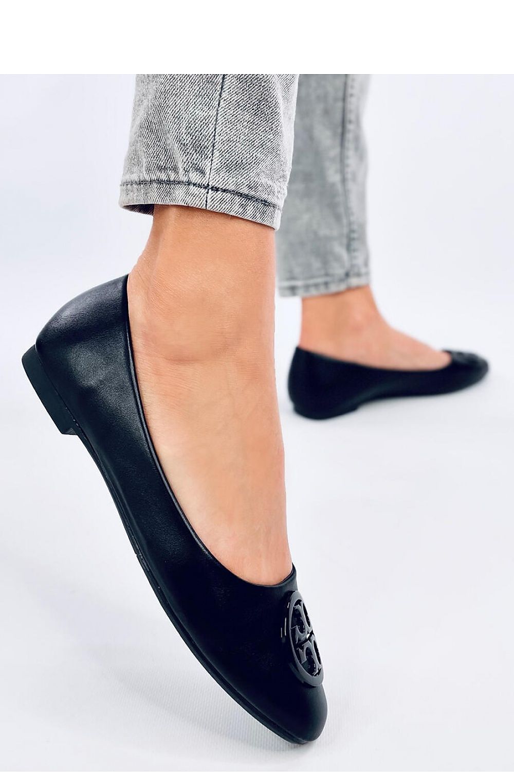 Stylish Inello ballerina flats for women displayed in a fashionable setting, highlighting their elegant design and soft inner insole for all-day comfort.