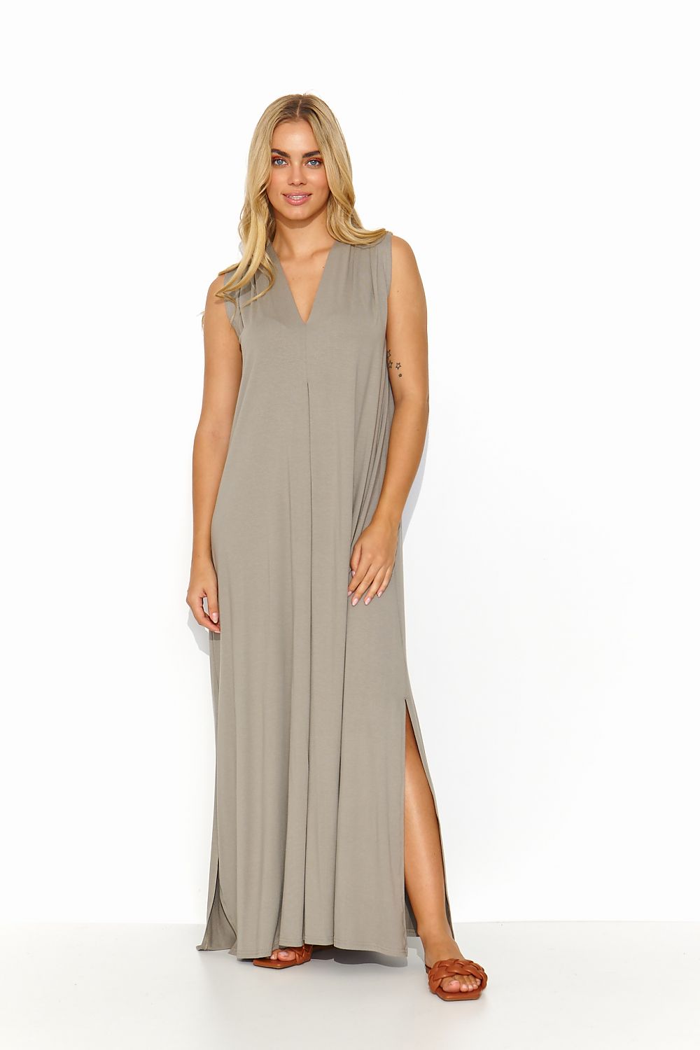 Elegant Makadamia Loose Maxi Dress with Sweetheart Neckline and Fashionable Slits, perfect for summer occasions