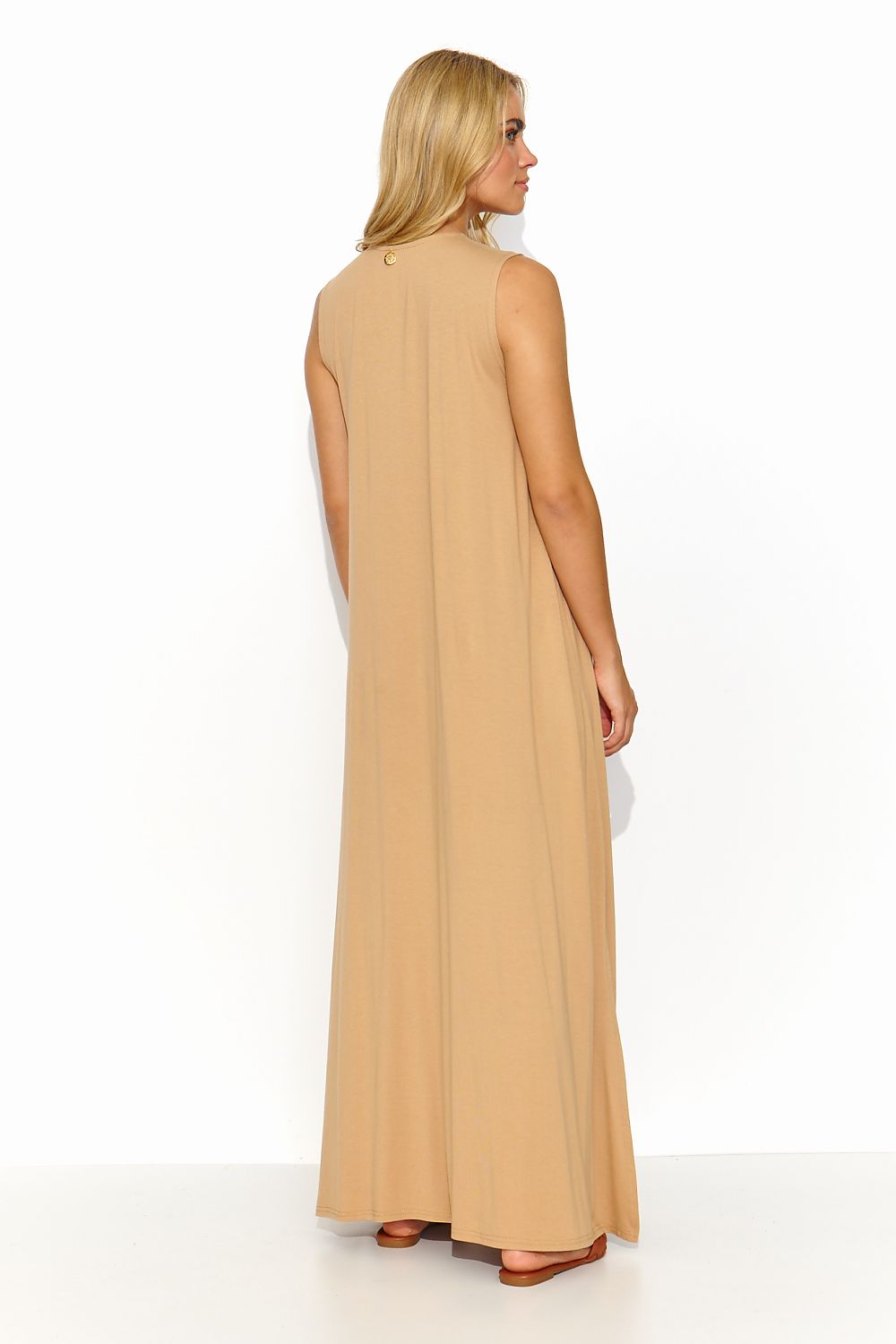 Makadamia loose maxi dress showcasing a sweetheart neckline and stylish slits, perfect for summer elegance. Ideal for casual outings or formal events.
