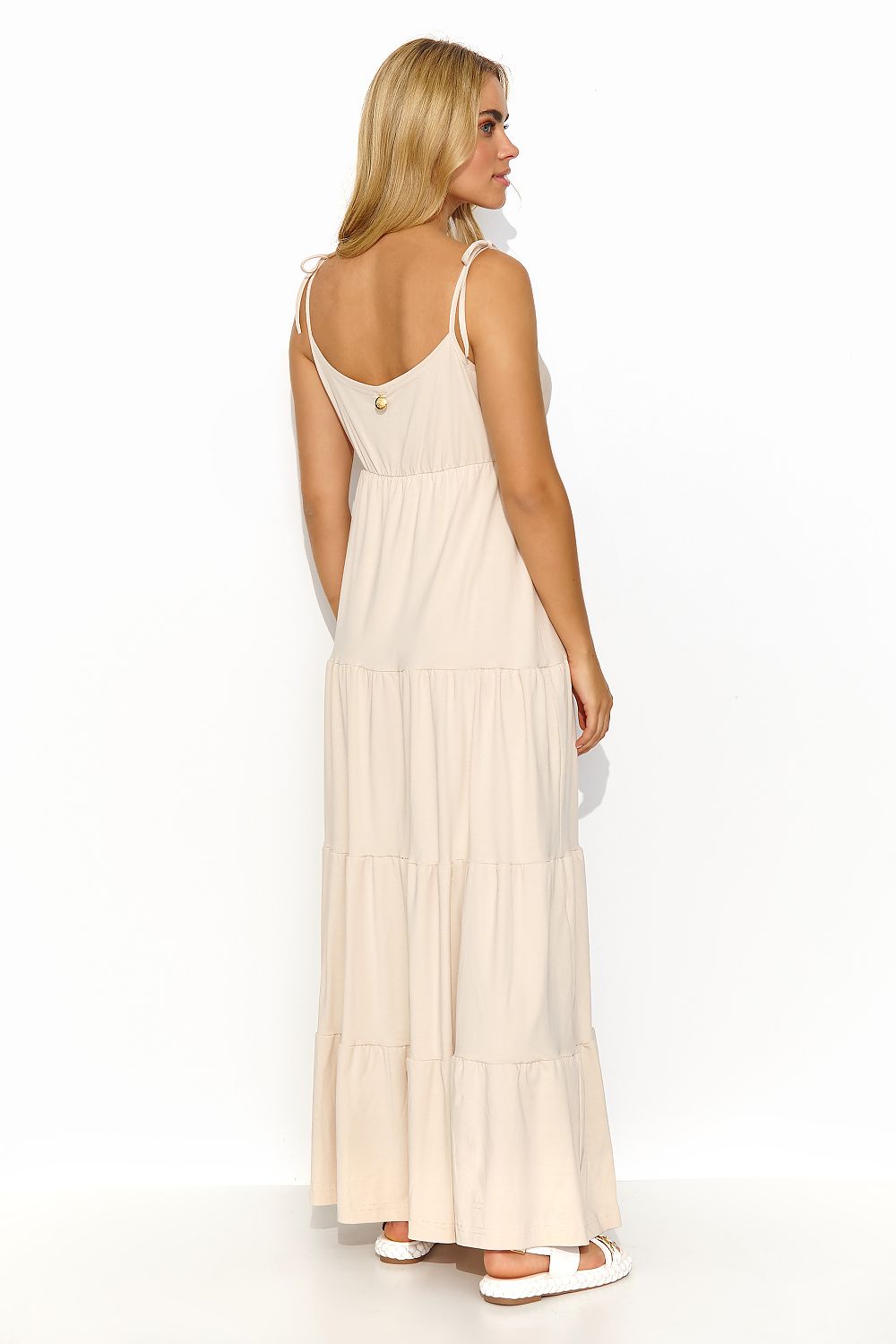 Chic Makadamia long summer dress with an ornate gold backplate detail, embodying romance and elegance in summer fashion.