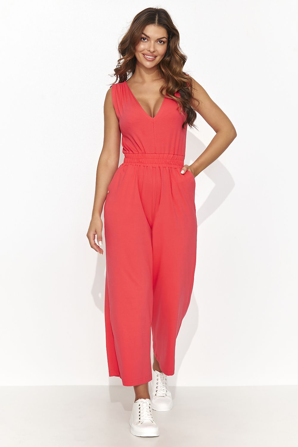 Elegant Numinou Women's Knit Jumpsuit with a drawstring waist, offering both functionality and style for the contemporary woman.