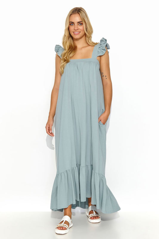 Makadamia Summer Maxi Dress featuring elegant ruffled shoulders and side pockets, perfect for luxurious summer occasions.