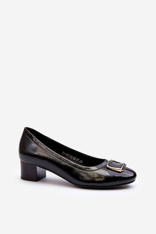 Chic black eco leather pumps with almond toe design and stylish buckle embellishment by Step in Style, showcased in a minimalist setting.