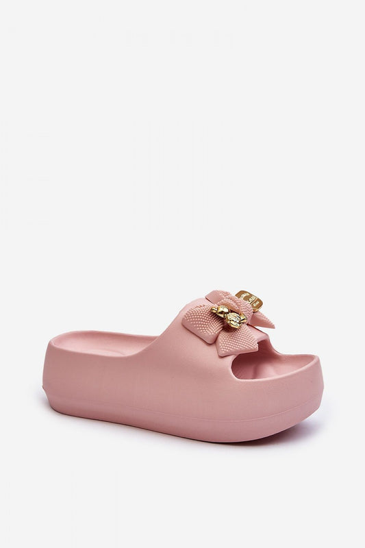 Close-up view of Step in Style Luxury Women's Flip-Flops showcasing the elegant bow detail and soft foam construction for ultimate comfort.