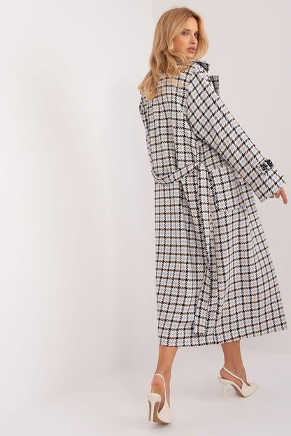 Stylish model wearing the Lakerta Transitional Check Pattern Coat, embodying luxury fashion perfect for casual outings or sophisticated events.