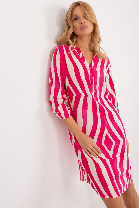Sophisticated Eco-Friendly Daydress by Sublevel, featuring an asymmetrical cut, heart neckline, and long sleeves, crafted from luxurious soft viscose for a stylish yet comfortable summer look.