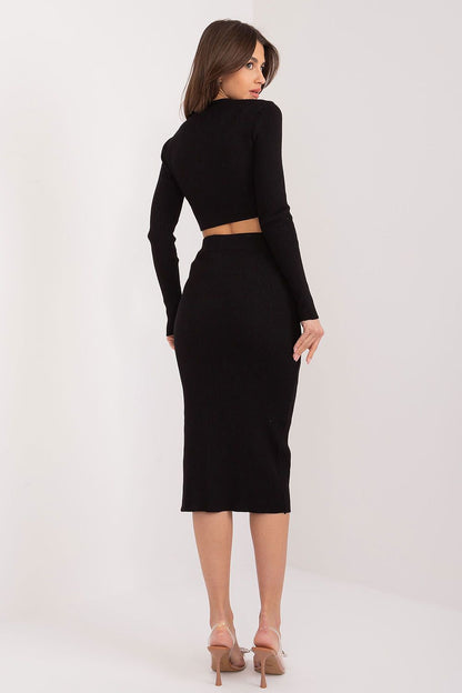 Chic presentation of the women's midi skirt with ribbed material, part of the casual sweater and skirt set by Factory Price, perfect for elevating daily looks.