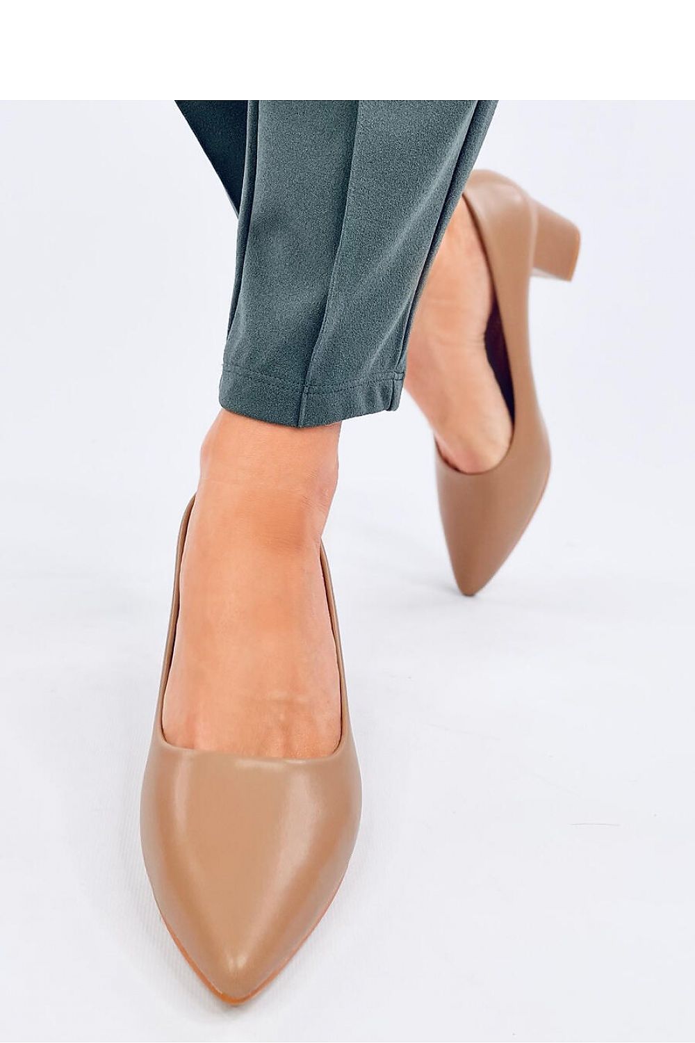 Luxurious 5.5cm block heel pumps for women by Inello, showcasing a classic design made of eco-friendly leather.