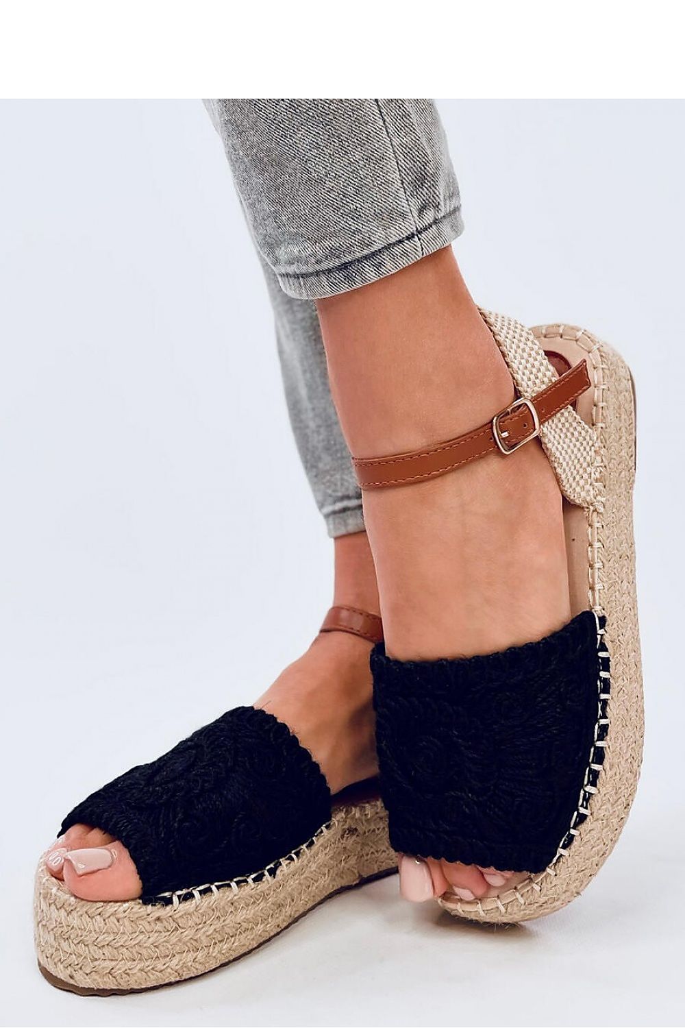 Elegant women's open toe espadrille sandals by Inello featuring an ankle closure and high sole in boho style.