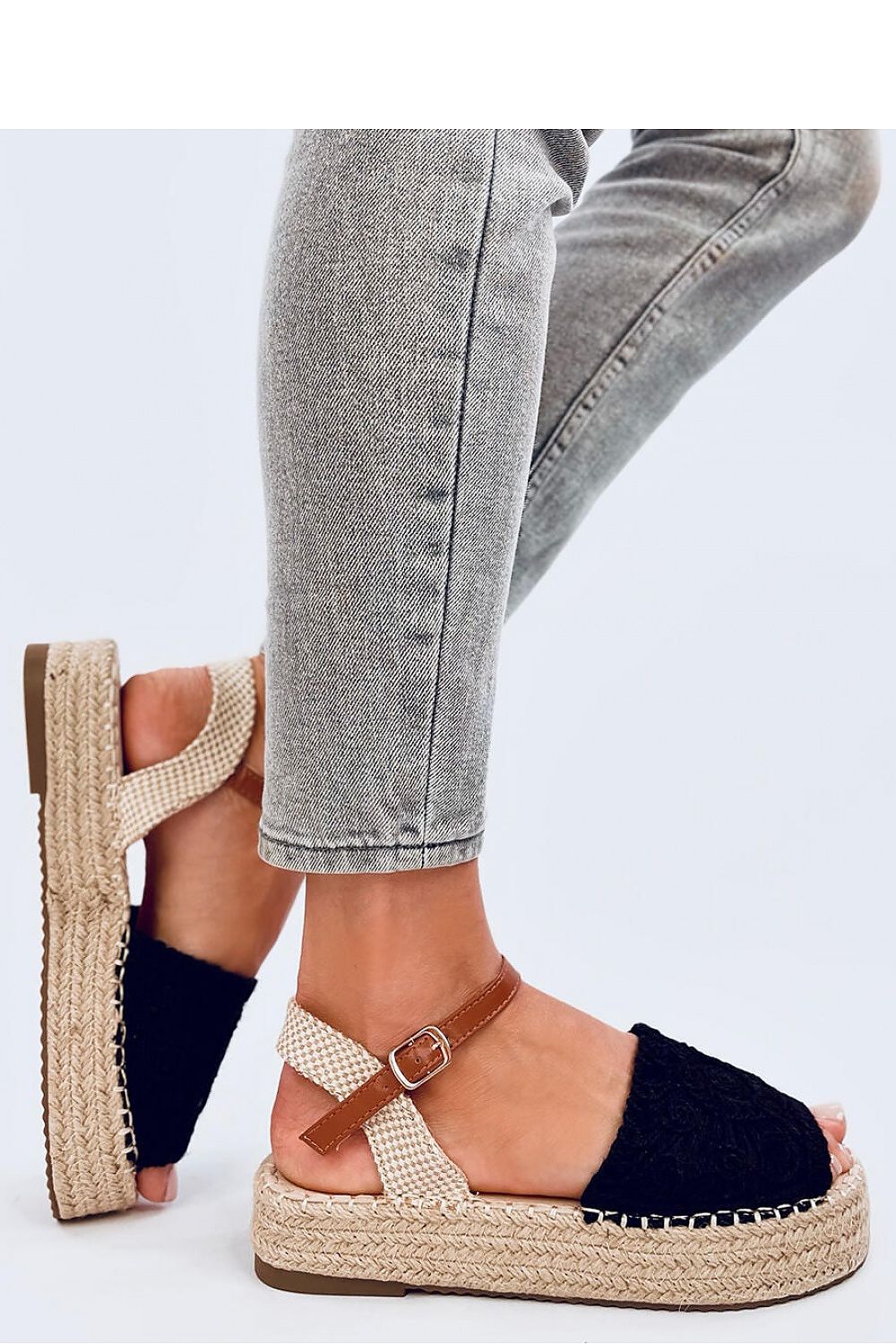 Luxurious Inello women's espadrille sandals with a high sole and stylish ankle strap, perfect for bohemian fashion.