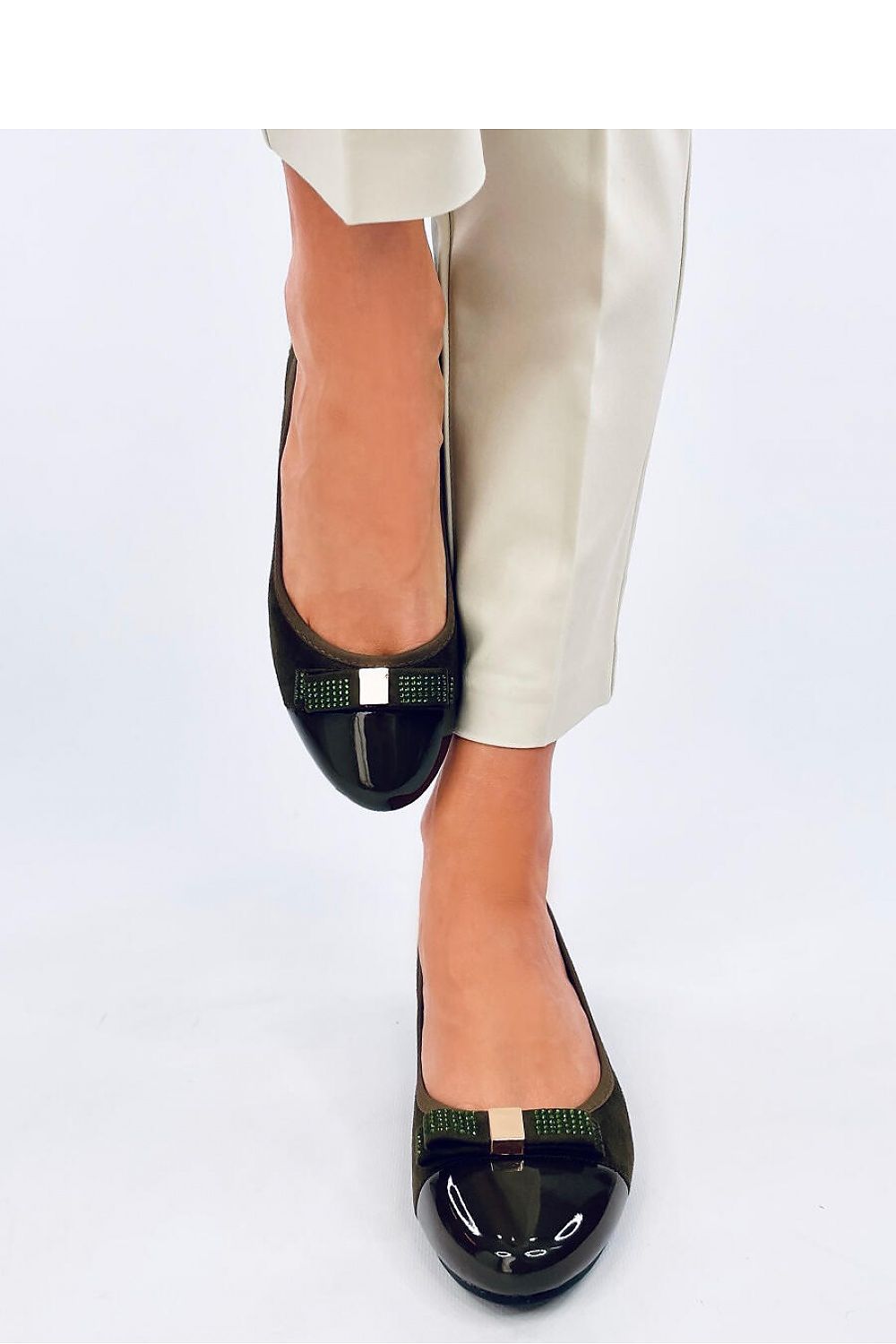 A sleek display of Inello women's elegant ballerina flats adorned with zircon embellishments, perfectly merging style with sustainability for the contemporary woman.