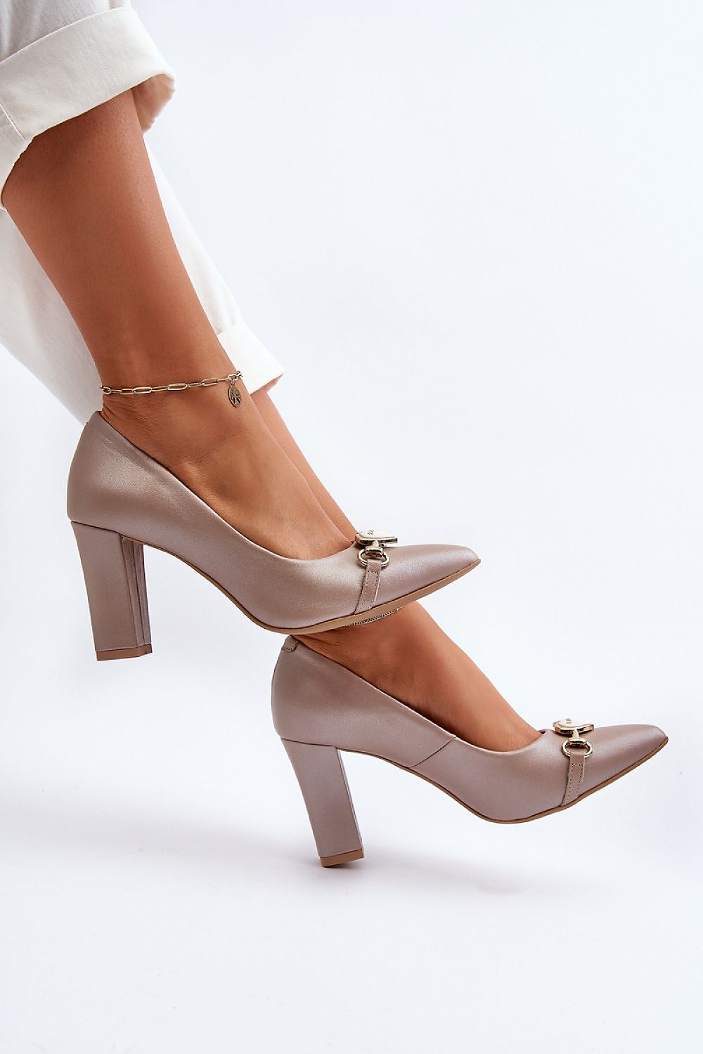 Elegant natural leather block heel pumps with heart-shaped ornament, showcasing luxury and style by Step in Style.