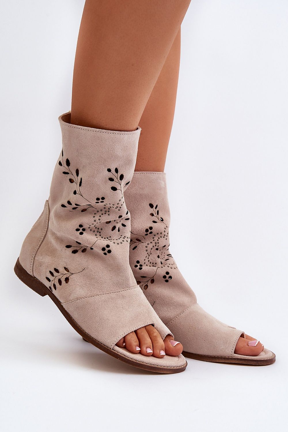 Elegant flat-heeled suede sandals by Step in Style featuring a zippered openwork upper, perfect for adding luxury to any outfit.