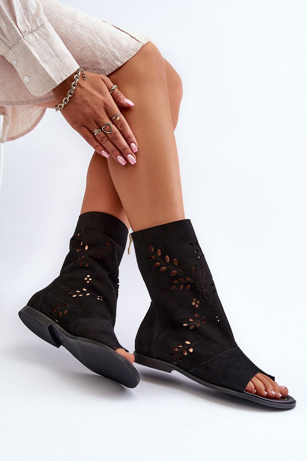 Stylish suede sandals from Step in Style with a delicate openwork design and flat heel, ideal for both everyday wear and special occasions.