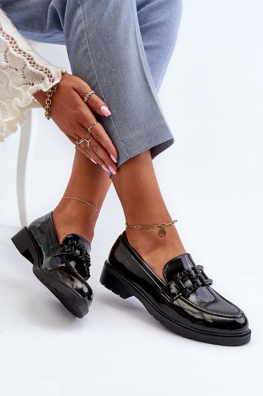 Elegant S.Barski women's moccasins showcased on a model, featuring a flat heel and unique ornamentation, perfect for spring. Vendor: Step in Style.
