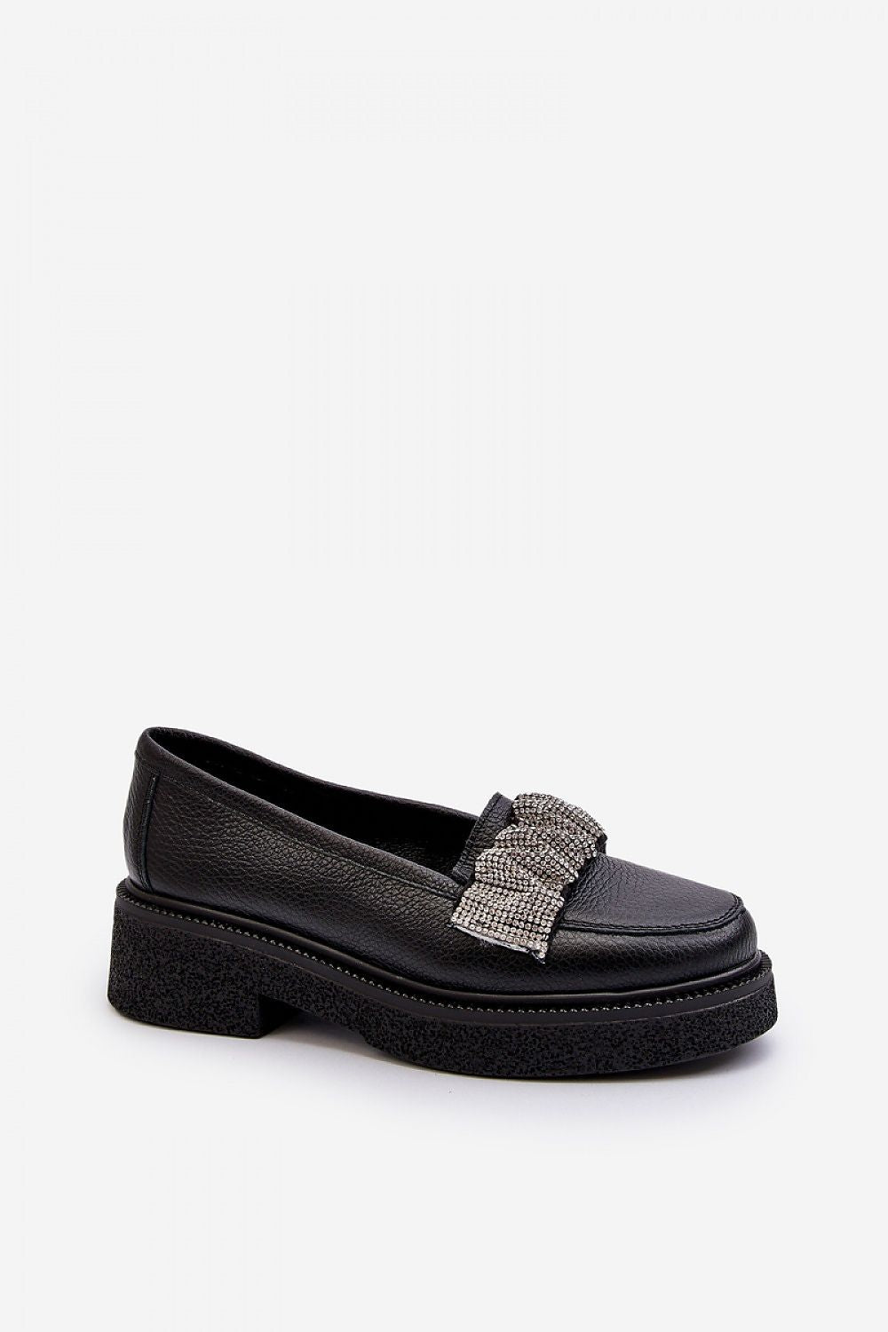 Close-up of Step in Style's women's natural leather moccasins, featuring a chic crinkled strap adorned with sparkling zircons for added elegance.