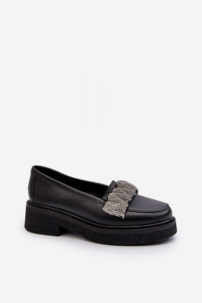 Close-up of Step in Style's women's natural leather moccasins, featuring a chic crinkled strap adorned with sparkling zircons for added elegance.