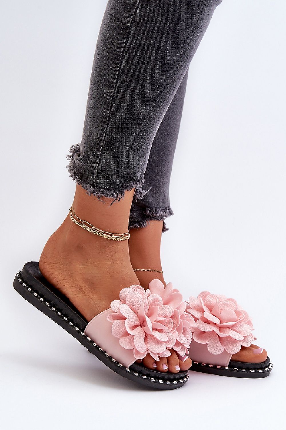 Elegant women's rubber flip-flops featuring luxurious front decoration by Step in Style, perfect for hot days and stylish outfits.