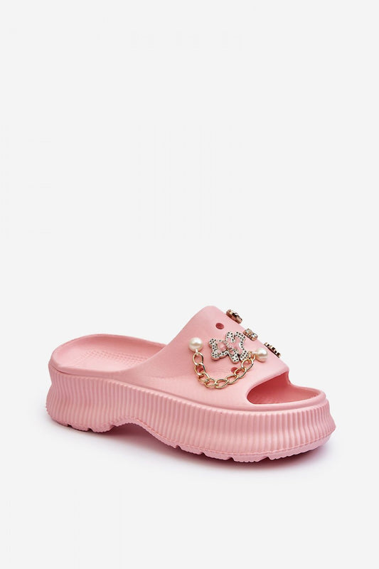 Luxurious pink foam flip-flops by Step in Style, featuring elegant embellishments and a 4 cm thick platform for ultimate comfort.