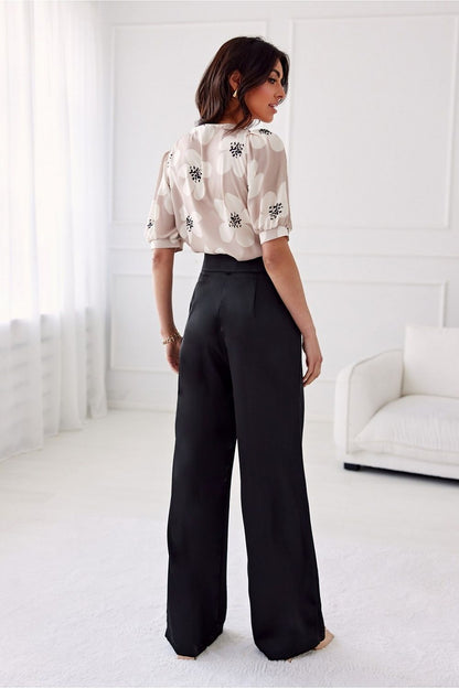 Elegant Roco Fashion Elsa Satin Wide-Leg Trousers showcasing luxurious fabric and high waist design, perfect for sophisticated occasions.