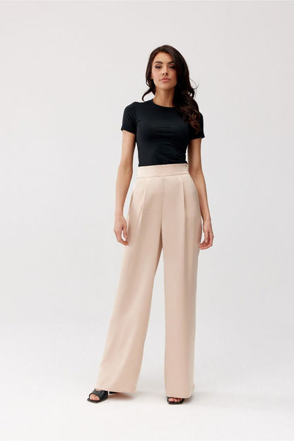 Chic Roco Fashion Elsa Wide-Leg Trousers elegantly paired with a fitted blouse, perfect for upscale events.