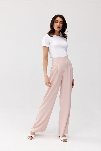 Fashionable model wearing Alaya Women's Trousers by Roco Fashion, highlighting the figure-flattering wide leg and high waist.