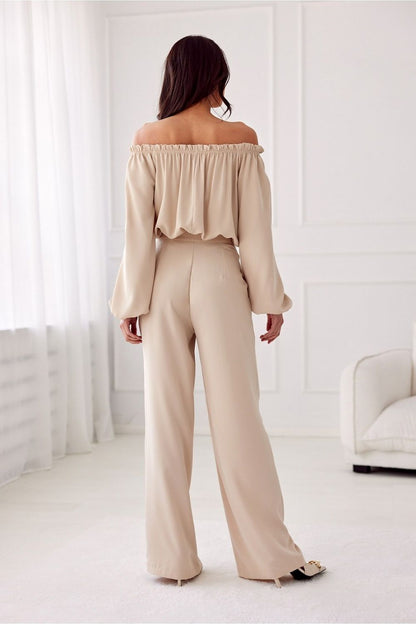 Elegant Alaya Women's Trousers by Roco Fashion, featuring a high-waisted wide leg design and side pockets, epitomising luxury and comfort.