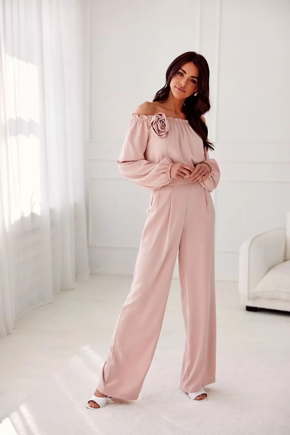 Close-up of the decorative rose detail on the Rosie Satin Blouse by Roco Fashion, highlighting its exquisite craftsmanship and elegant design.