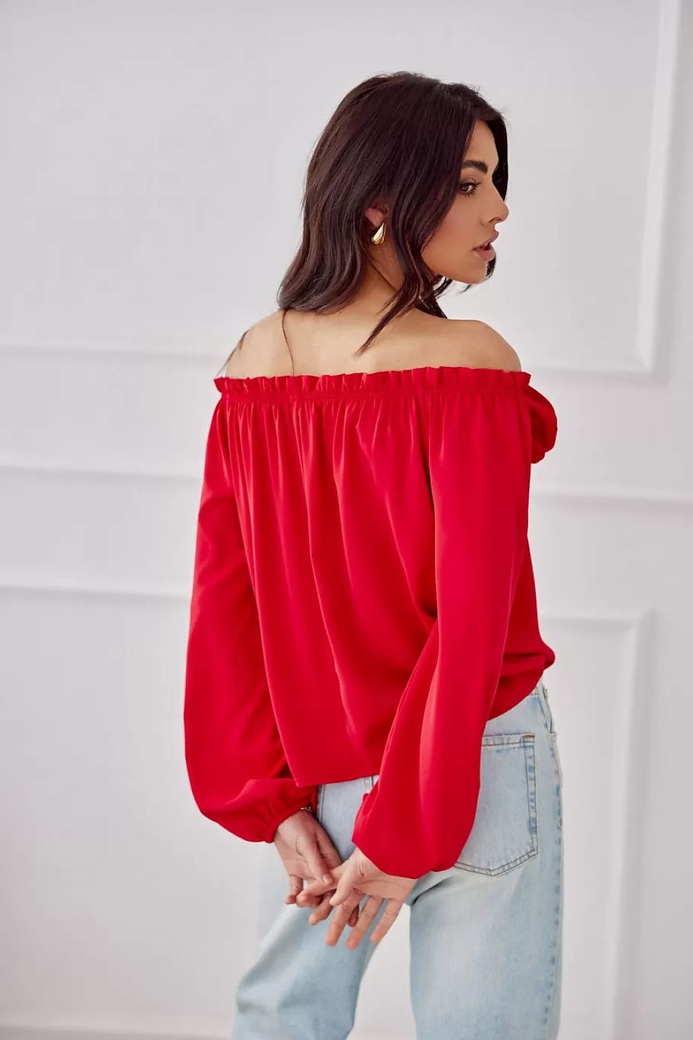 Side view of the Rosie Satin Blouse by Roco Fashion, emphasizing the comfort and fit provided by the sewn-in elastic and lightweight satin fabric.