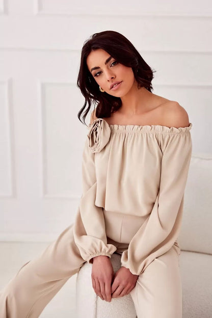 Full outfit styling featuring the Rosie Satin Blouse by Roco Fashion, elegantly paired with long pants and stilettos for formal events and special occasions.