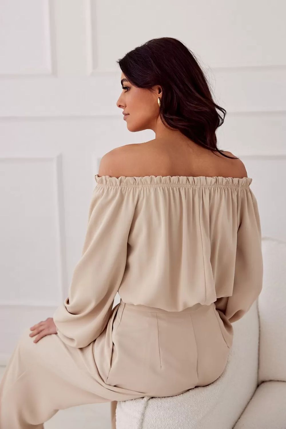 Close-up of the decorative rose detail on the Rosie Satin Blouse by Roco Fashion, showcasing its unique and exquisite design.