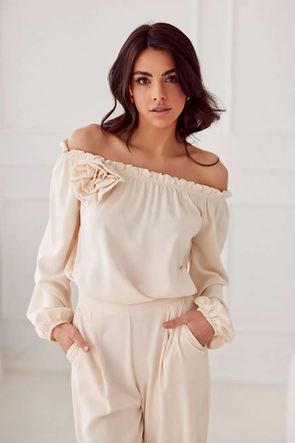 Side view of the Rosie Satin Blouse by Roco Fashion, highlighting the beautiful satin fabric and flowing sleeves for a sophisticated look.