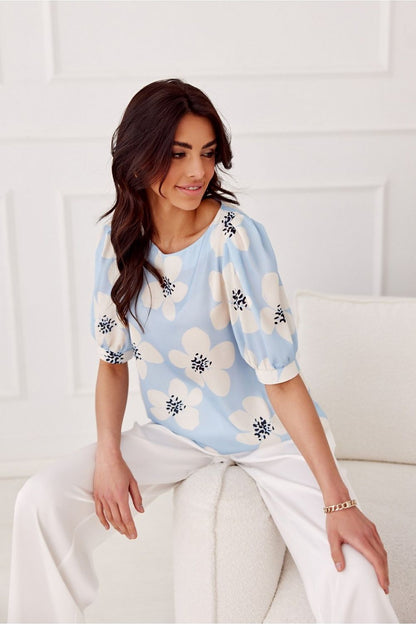 Close-up of the luxurious fabric of Jenna Blouse by Roco Fashion, showcasing its elegant round neckline and comfortable polyester composition.