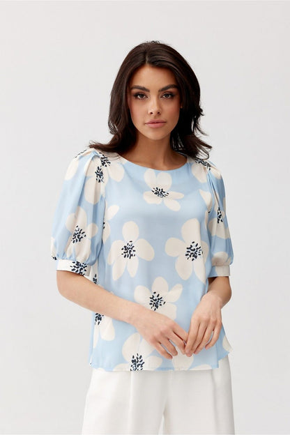 Elegant Jenna Blouse by Roco Fashion featuring unique buffet sleeves and a classic casual cut, beautifully styled with a round neckline for a feminine silhouette.