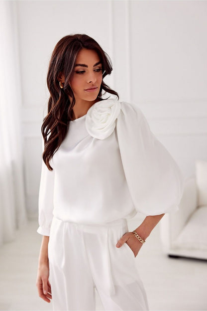 Elegant Giana Satin Blouse by Roco Fashion featuring a stunning rose detail and sophisticated 3/4 sleeves.