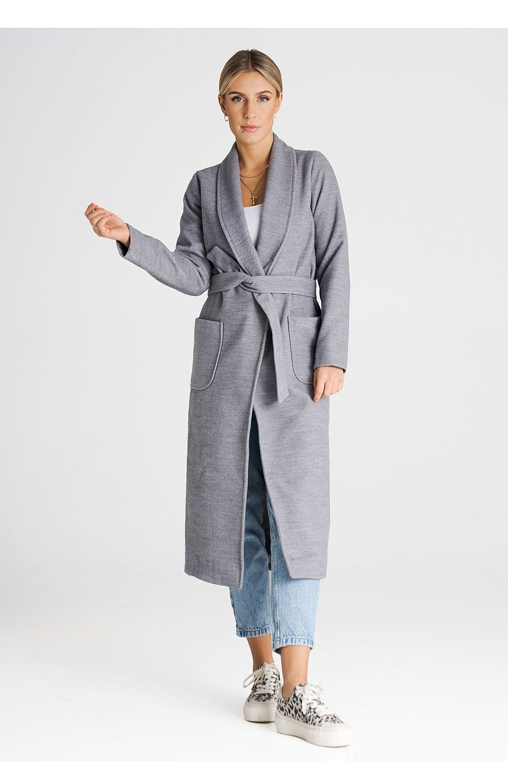 Elegant long coat with a tie belt and patch pockets by Figl, perfect for a sophisticated winter look.