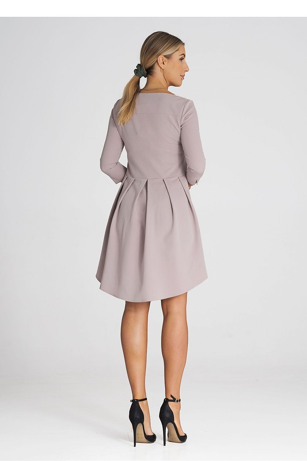 Elegant Figl asymmetrical cocktail dress featuring 3/4 sleeves and a sophisticated pleated back, perfect for upscale events.