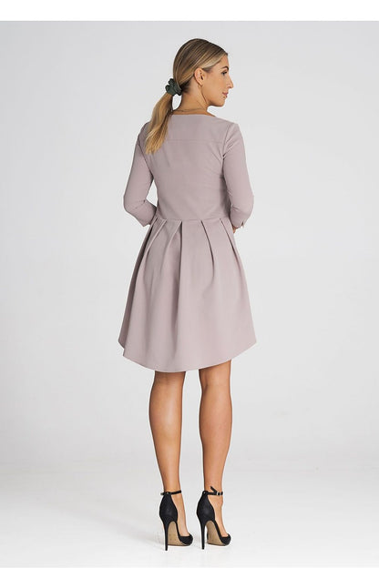 Elegant Figl asymmetrical cocktail dress featuring 3/4 sleeves and a sophisticated pleated back, perfect for upscale events.