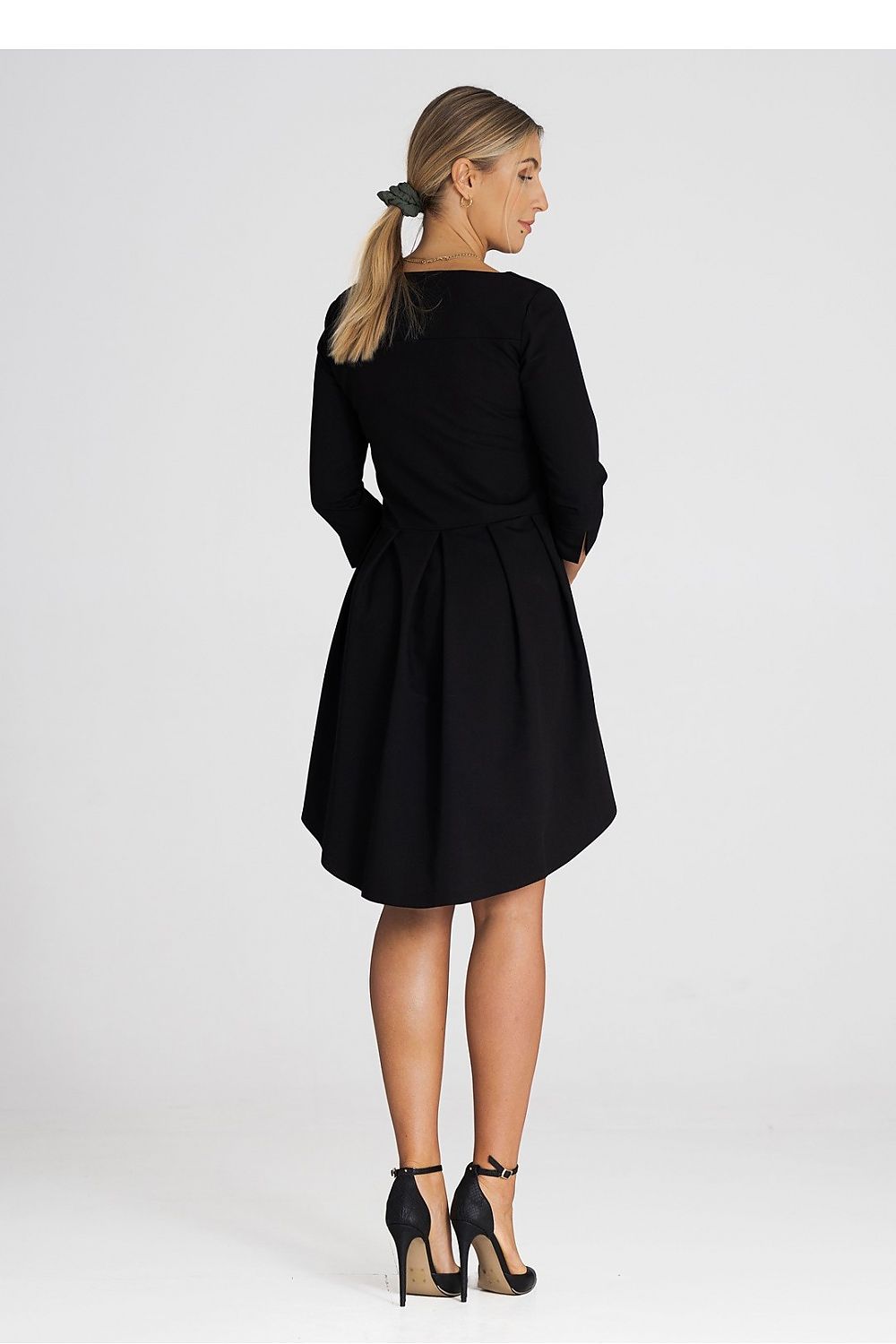 Sophisticated Figl asymmetrical cocktail dress with luxurious 3/4 sleeves and an elegantly pleated back, embodying refined style for any occasion.