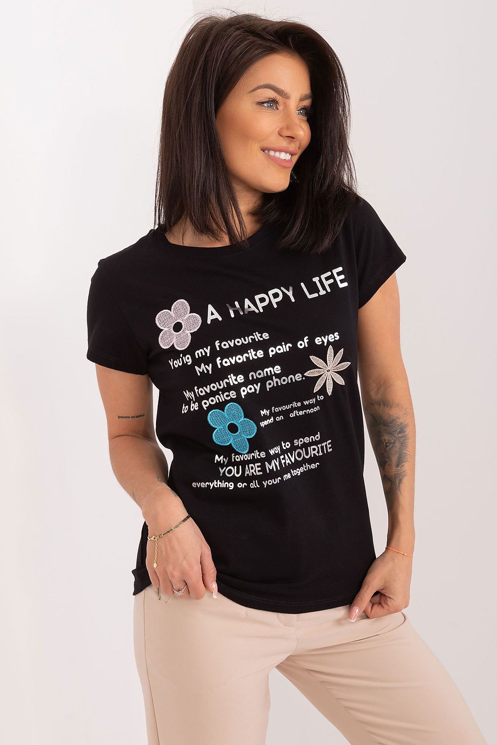 BFG summer blouse styled with light trousers, perfect outfit for a chic summer ensemble, combining comfort and elegance.