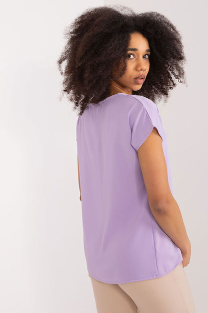 Elegant polyester blouse by BFG, showcasing simple yet chic fashion suitable for work or casual outings.
