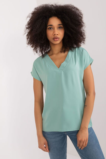 Versatile casual top by BFG, featuring a flattering heart neckline and light fabric for a luxurious everyday style.