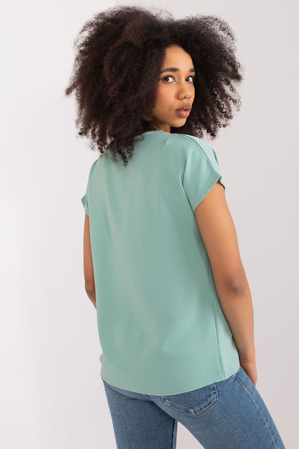 Close-up of BFG heart neckline casual blouse, highlighting the smooth polyester texture and feminine design elements.